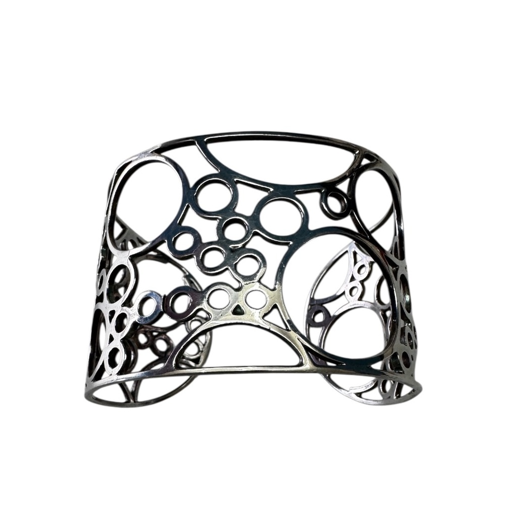 In the style of Georg Jensen #466 (see photograph) - this is NOT a Jensen but in